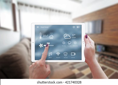 Smart Home Control On Tablet. Interior Of Living Room In The Background.