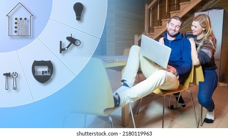 Smart Home Control Via Laptop. Happy Family Lives In Smart Home. Man And Woman Control IOT Via Wi-fi. Modern IOT Technologies. Happy Family In Cottage Kitchen. Country House Equipped With IOT Devices