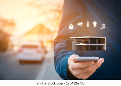 Smart home, intelligent house, and home automation app security concept. Smart phone user walking on street and set intelligent home settings on smart home app.