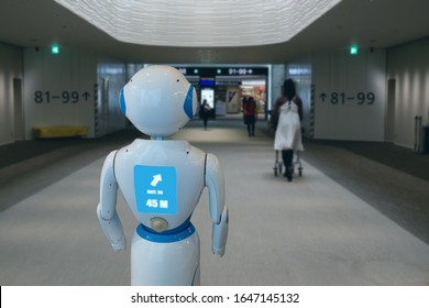 Smart Hotel In Hospitality Industry 4.0  Concept, The Receptionist Robot (robot Assistant ) In Lobby Of Hotel Or Airports Always Welcome Customer The Service Is  Including Room, Information Provision