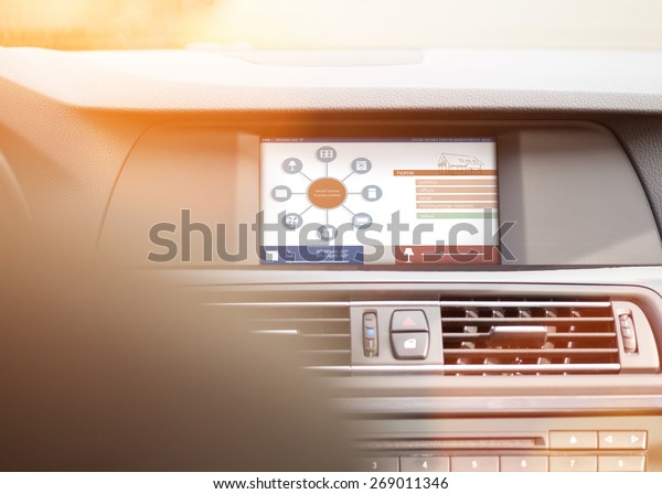 smart house, home\
automation, device illustration with app icons. Man is using his\
smart home automation car\
app
