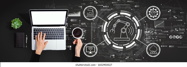 Smart industry concept with person using a laptop computer - Powered by Shutterstock