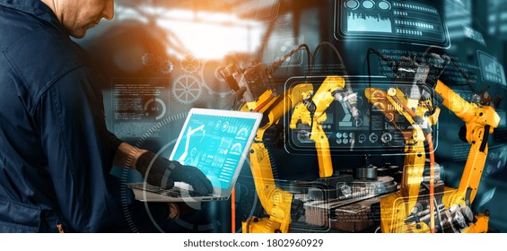 Smart Industry Robot Arms For Digital Factory Production Technology Showing Automation Manufacturing Process Of The Industry 4.0 Or 4th Industrial Revolution And IOT Software To Control Operation .