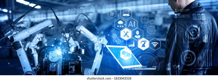 Smart industry robot arms for digital factory production technology showing automation manufacturing process of the Industry 4.0 or 4th industrial revolution and IOT software to control operation . - Shutterstock ID 1833043318