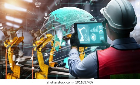 Smart industry robot arms modernization for digital factory technology . Concept of automation manufacturing process of Industry 4.0 or 4th industrial revolution and IOT software control operation . - Shutterstock ID 1911837439