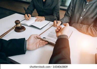 smart lawyer review and give advice to clients in the office before considering the judgment, lawyer concept