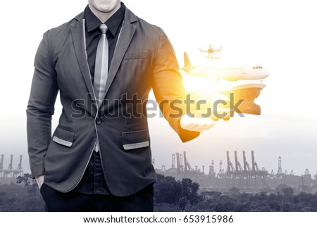 Smart logistic technology , internet of things , industry 4.0 and supply chain concept. Double exposure of man suit with airplane ,drone,truck,Cargo ship , shipyard and container on his hand.