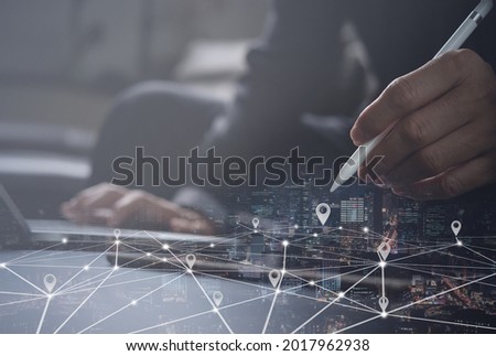 Smart logistics, GPS map, pin address location on mobile apps, global business. Double exposure of business man using digital tablet searching target place and the city with internet network