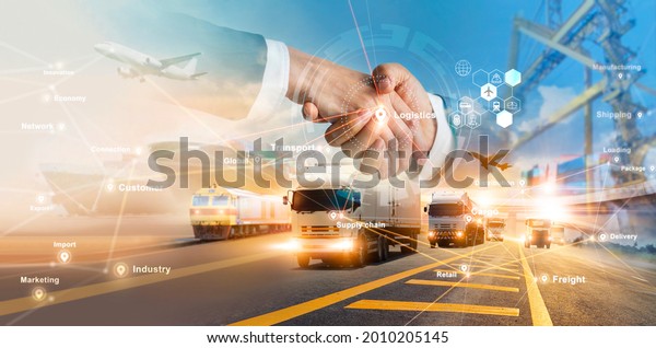 Smart logistics and transportation.\
Handshake for successful of investment deal teamwork and\
partnership business partners on logistic global network\
distribution. Business of transport industrial.\
