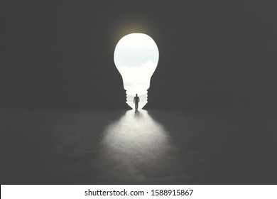 Smart Man Walking Through Bulb Shape Door, Creative Concept