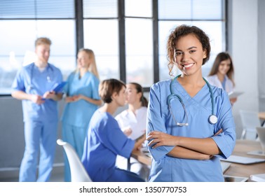 Smart medical student with her classmates in college
