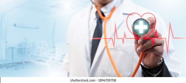 Smart medicine doctor and stethoscope in hand touching heart rate icon with modern virtual screen interface,healthcare medical,Insurance for your health concept.