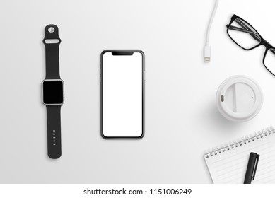 Smart Mobile Phone And Watch On Clean Office Desk. Black And White Composition. Flat Lay.