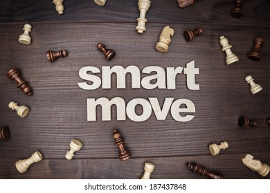 Smart Move Concept On The Brown Wooden Background