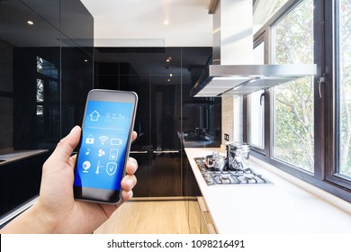 Smart Phone With Apps In Modern Kitchen