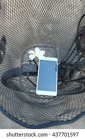 Smart Phone And Flower In The Bicycle Basket,top View.