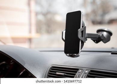 Smart phone with holder in modern car use for Navigate ,GPS