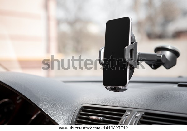 Smart phone with holder in modern car use for\
Navigate ,GPS
