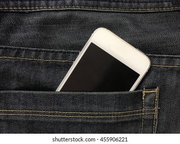 Smart phone in jeans pocket. Concept is Life in the Age of Technology