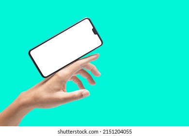 Smart Phone On The Back Of The Hand, Isolate On Blue Green Background