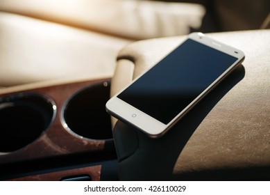 Smart Phone Phone On The Car Seat Dashboard