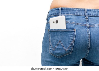  Smart phone in the rear pocket of a woman jeans on  white background
