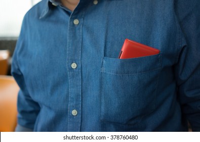 Smart Phone In Shirt Pocket Of A Business Man