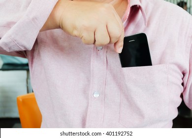 Smart Phone In Shirt Pocket Of A Business Man