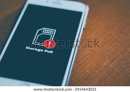 Smart phone with storage full icon on screen. Communication, cellular problem concept.