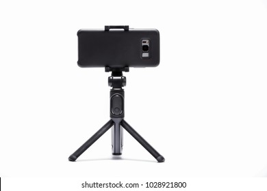 Smart Phone And Tripod Isolated On White Background