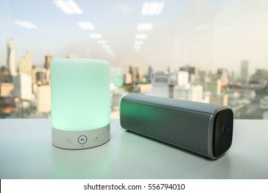 Smart Portable Music Speaker Light With Wireless Bluetooth Speaker On Table