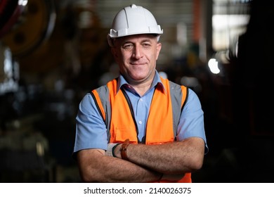 Smart Portrait, Male Senior Engineer Standing With His Arms Crossed Confidently.