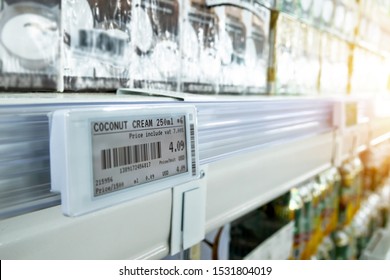 Smart retail digital store technology concept.Electronic Shelf Label(ESL) led for automatically updated displaying product pricing on shelves for retail business. Price is change from control service. - Shutterstock ID 1531804019