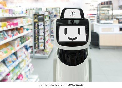 Smart Retail , Robot Assistant , Robo Advisor  , Artificial Intelligence , Service Navigation Robot Technology In Department Retail Store. Robot Smile To Customer And Wait Command To Help.