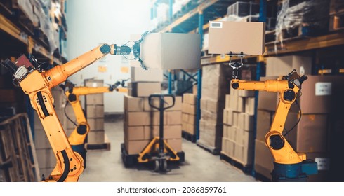 Smart robot arm system for innovative warehouse and factory digital technology . Automation manufacturing robot controlled by industry engineering using IOT software connected to internet network .
