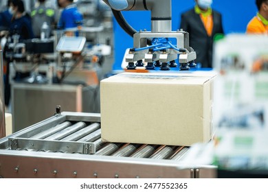 Smart robot arm system for innovative warehouse and factory digital technology . Automation manufacturing robot controlled by industry engineering using IOT 
