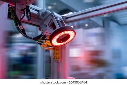 smart robot in manufacturing industry for industry 4.0 and technology concept. Robotic vision sensor camera system in intellegence factory - Shutterstock ID 1643052484