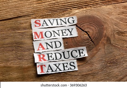 Smart -Saving Money And Reduce Taxes  Acronym In Business Concept,