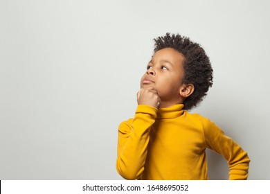 Smart Schoolboy Black Kid Boy Thinking On White Background