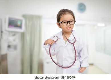 Smart scientist child writing something in the air - Powered by Shutterstock