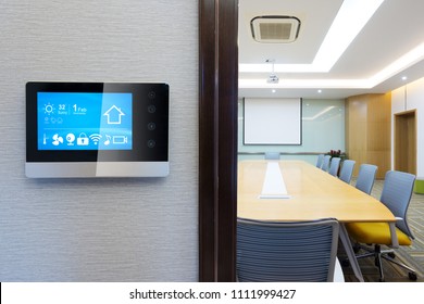 Smart Screen With Smart Home Apps On Wall In Meeting Room
