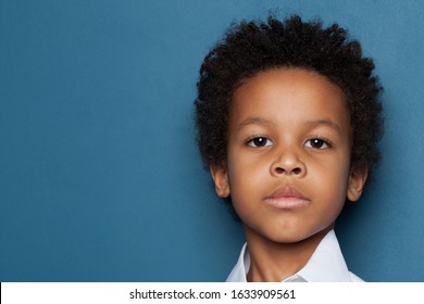 Smart Serious Black Kid Boy Face Close Up Portrait