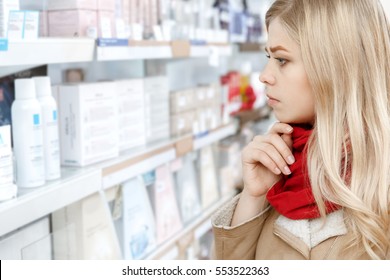 Smart Shopping. Close Up Cropped Profile Shot Of A Beautiful Young Woman Choosing Products Thoughtfully At The Local Store Copyspace Store Shop Shopper Choice Choosing Shopping Consumerism Concept