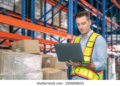 Smart Smiling Caucasian Warehouse Man,worker,manager Use Laptop To Check Goods On Shelf For Product Distribution Stock Management, Logistics Shipping Business Planning Concept With Copy Space