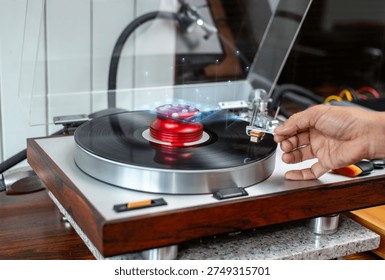 Smart technology interface showing wireless connection and data network above a vinyl turntable, representing connected audio device, IoT system, digital control and future home entertainment concept