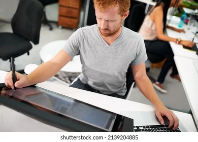 Smart Technology Makes Everything Easier. A Young Man Working On A Large Touchscreen.