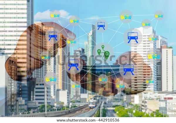 Smart transportation with\
internet of things concept Smart transportation network on double\
exposure of man using smart phone and city infrastructure\
background.