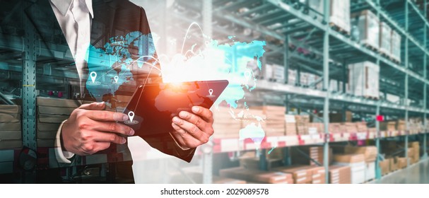 Smart warehouse management system with innovative internet of things technology to identify package picking and delivery . Future concept of supply chain and logistic network business . - Shutterstock ID 2029089578