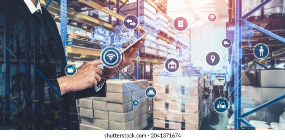 Smart warehouse management system with innovative internet of things technology to identify package picking and delivery . Future concept of supply chain and logistic network business . - Shutterstock ID 2041371674