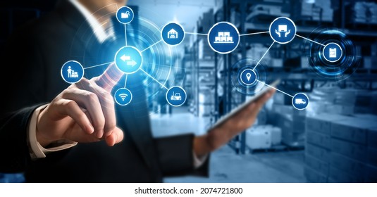 Smart warehouse management system with innovative internet of things technology to identify package picking and delivery . Future concept of supply chain and logistic network business . - Shutterstock ID 2074721800